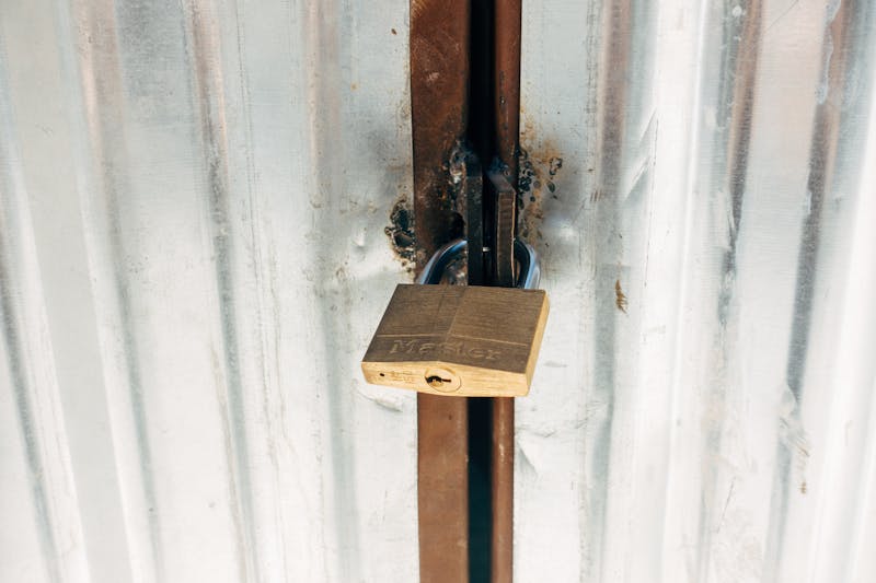 Secure storage facility with cameras keypad gate and well-lit aisles