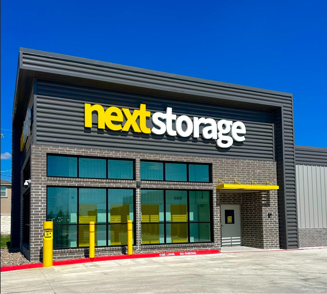 Next Storage facility entrance and drive-up row