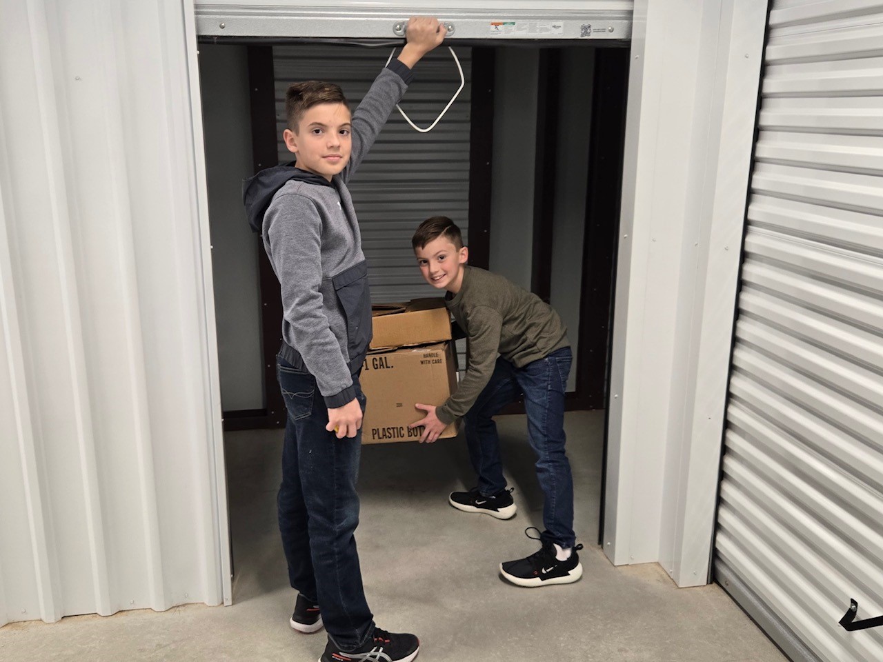 Drive-up storage units with roll-up doors for easy vehicle access
